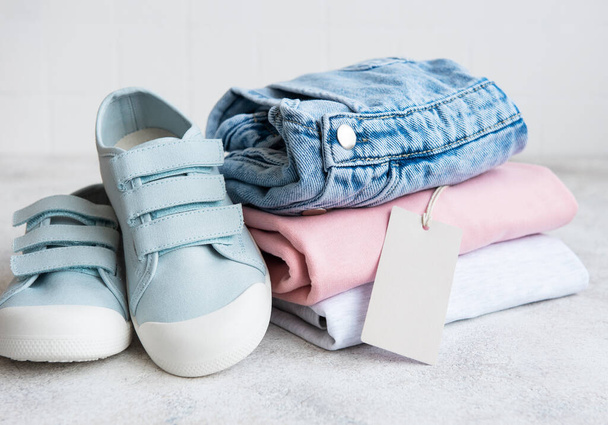 Clothes for kids. Online shopping concept. Delivery of clothes. - Foto, Imagem