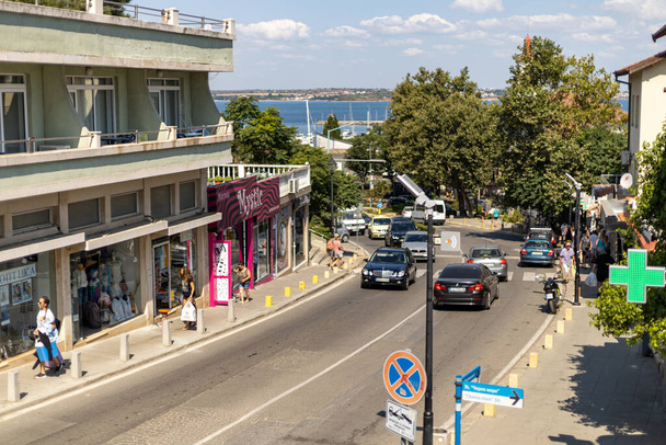 Sozopol. Burgas  Bulgaria - 07 24 2021: View from the center of Sozopol on a sunny, summer day. People and cars can be seen on the street - 写真・画像