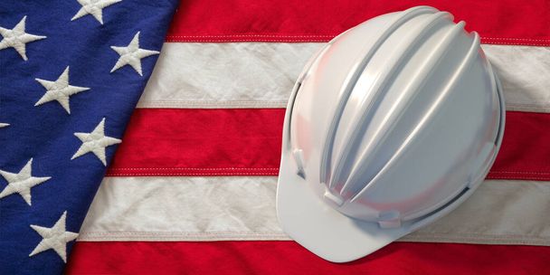 Хардхат білий колір на тлі прапора США. Безпека будівельної промисловості в США. 3d ілюстрація - Фото, зображення