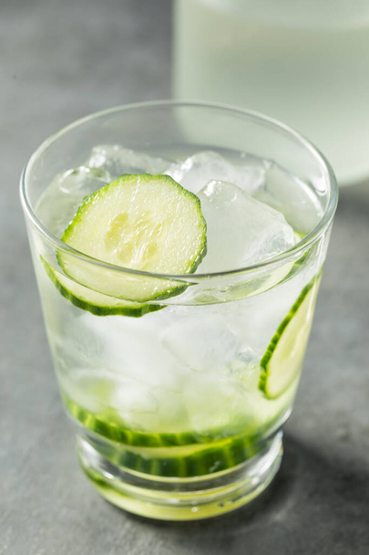 Refreshing Boozy Cucumber Shochu Cocktail with Ice - Фото, изображение