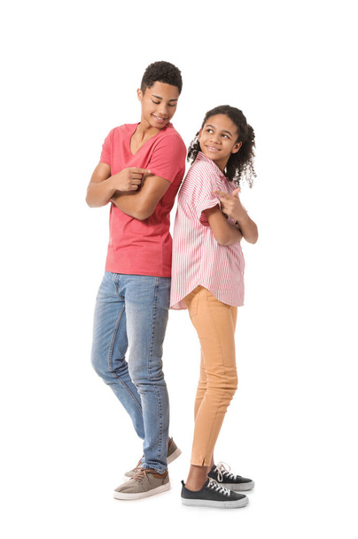 African-American brother and sister on white background - Foto, Bild