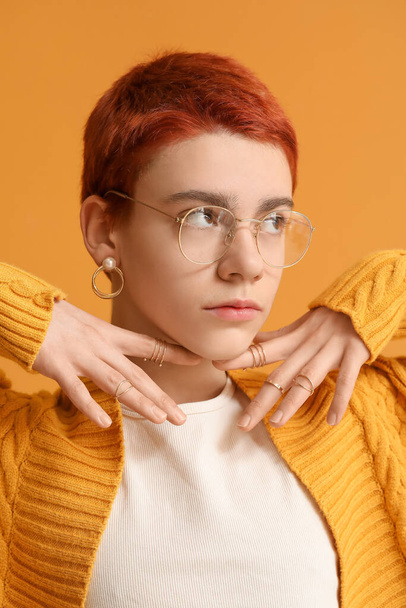 Non-binary teenager on color background - Foto, afbeelding