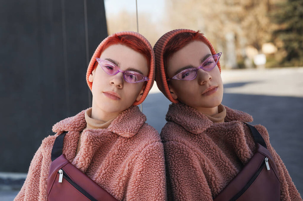 Portrait of non-binary teenager outdoors - Photo, Image