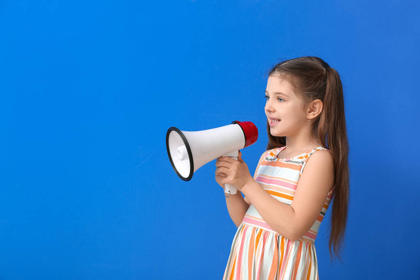 Little girl with megaphone training pronounce letters on color background - Zdjęcie, obraz