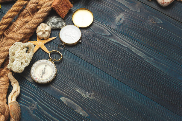 Nautical background. Sailing rope with a compass - 写真・画像
