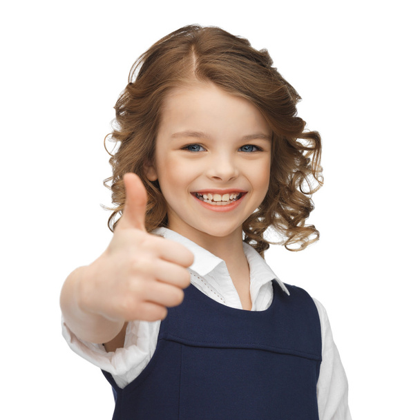 pre-teen girl showing thumbs up - Foto, afbeelding
