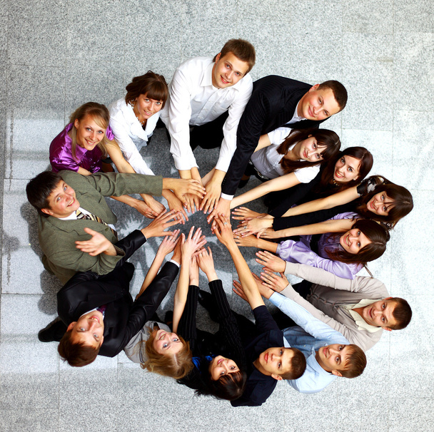 Top view of business with their hands together in a circle - Photo, Image