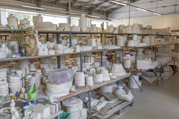 Konakovo, Russia - July 24, 2021: Inside the Konakovsky Faience Company production workshop. All works are created by the hands of craftsmen without the use of mechanisms - Фото, изображение