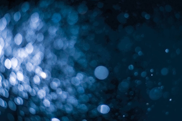 Abstract background image of blue bokeh from blurry lens. for background use - Photo, Image