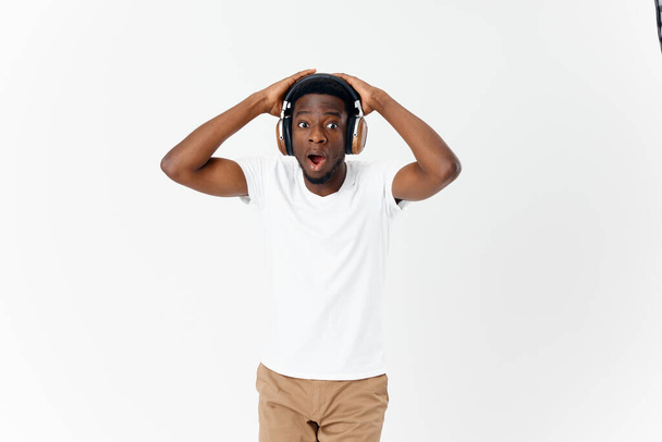 african-looking man wearing headphones technology lifestyle music lover - Photo, Image
