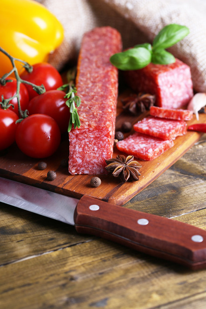 Tasty salami sausage and spices - Foto, Bild