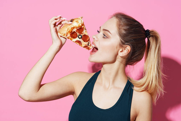 cute blonde singer sport snack pink background - Фото, изображение