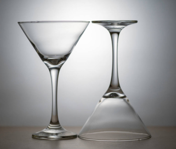 Black and white image of Martini glasses, backlit low key image. - Zdjęcie, obraz