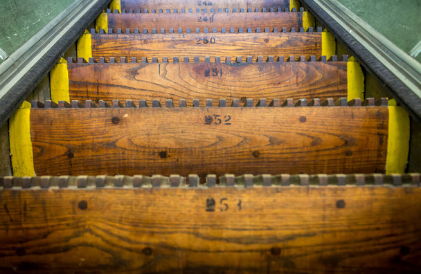 Old, wooden, numbered Escalator steps - Photo, Image