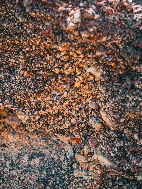 A vertical shot of a rocky surface in nature - perfect for mobile - Fotoğraf, Görsel