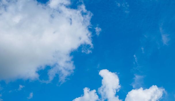 Blue sky and white clouds on a bright day - Zdjęcie, obraz