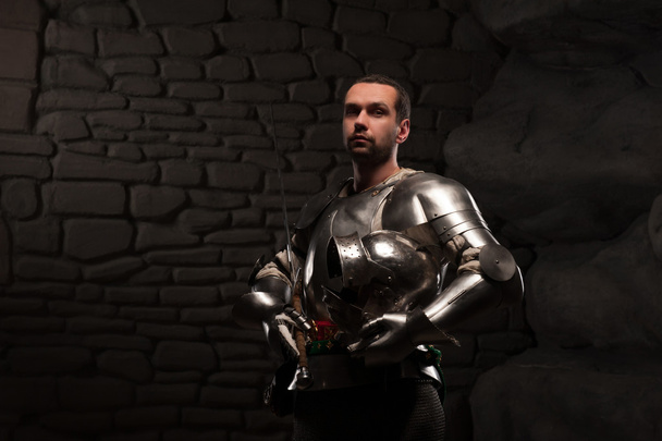 Medieval Knight posing with sword - Фото, изображение
