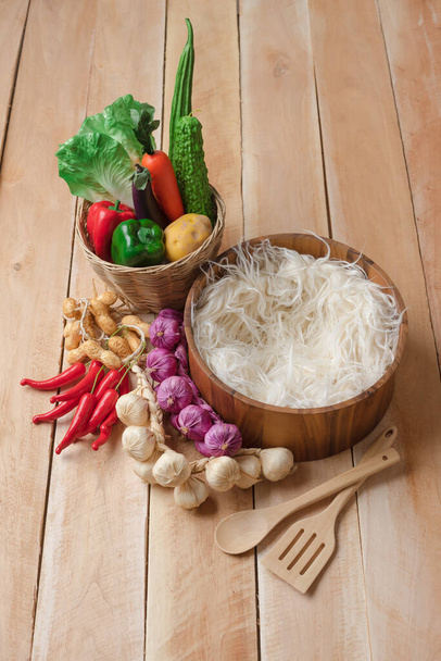 Vegetable in basket , potato , onion , garlic , pepper , carrot , peanut. - Фото, зображення