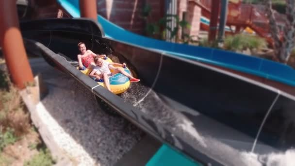 Mother And Daughter On A Water Slide - Footage, Video