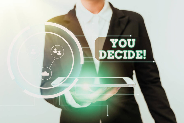 Text caption presenting You Decide. Word for giving a chance to somebody to decide over a set of choices Woman In Suit Standing Using Device Showing New Futuristic Virtual Tech. - Photo, Image