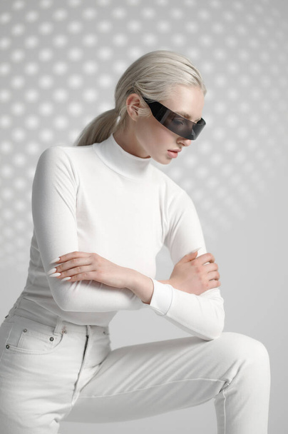 Model in white clothes and futuristic glasses - Fotoğraf, Görsel