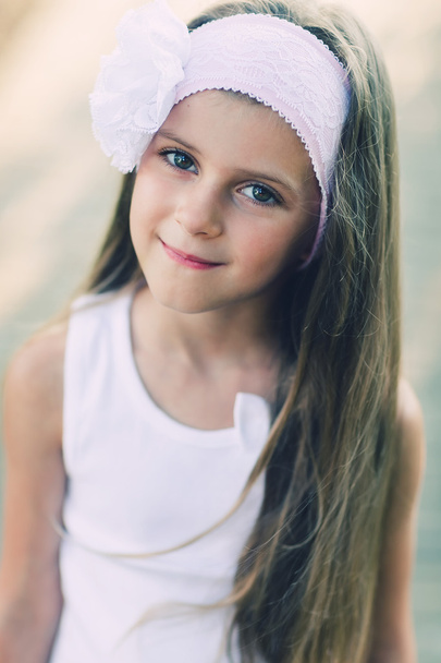 Portrait of adorable 6 years old girl. Photo processed instagram style - Φωτογραφία, εικόνα