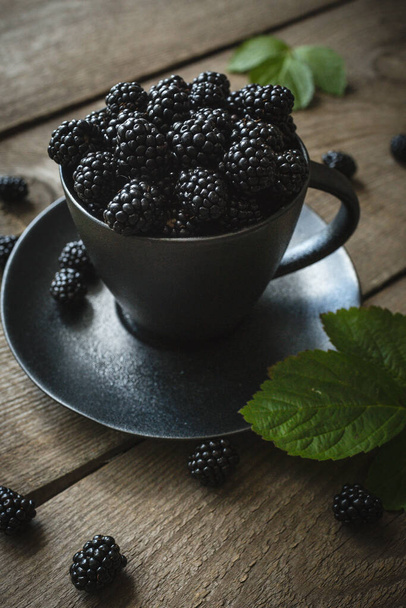 blackberries, fresh berries, wooden background, vegetarian food - Fotografie, Obrázek