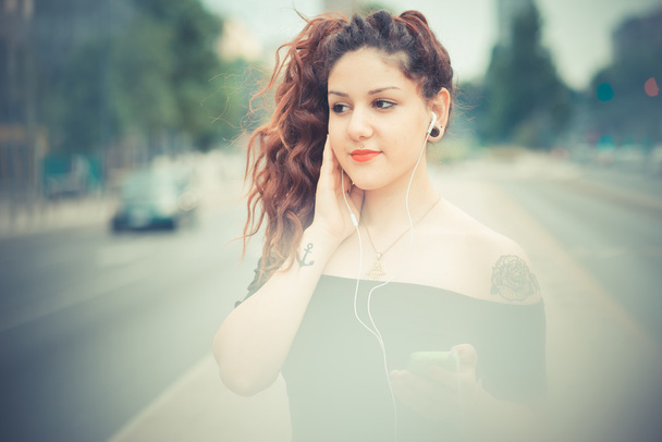 Curly hipster woman  listening music - Photo, Image