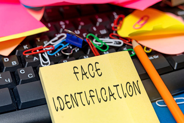 Sign displaying Face Identification. Concept meaning analyzing patterns based on the person s is facial contours Multiple Assorted Collection Office Stationery Photo Placed Over Table - Photo, Image