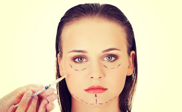cosmetische botox injectie in het gezicht - Foto, afbeelding