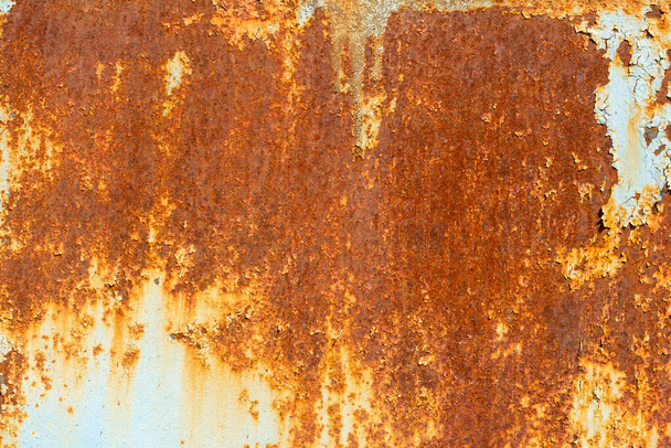 Rust.Old rusty metal background.An old blue metal wall with spots and streaks of rust - Photo, Image