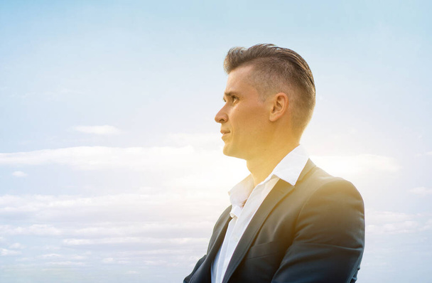 Business. Businessman Closeup Portrait Side View Clear Sky Background Caucasian Male Business Person Looking Away Confidence Concept Man Dressed Business suit White Shirt Copy Space - Foto, afbeelding