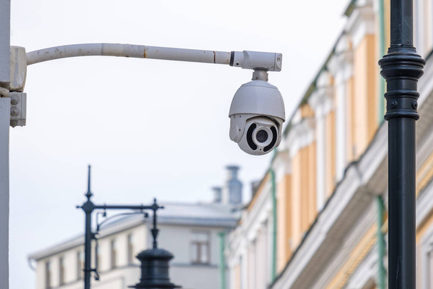 CCTV camera on a city street - Fotoğraf, Görsel
