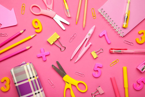 School supplies on pink background. Back to school concept. Top view. - Фото, изображение