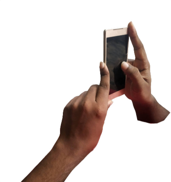 Рука, держащая сотовый телефон - Фото, изображение