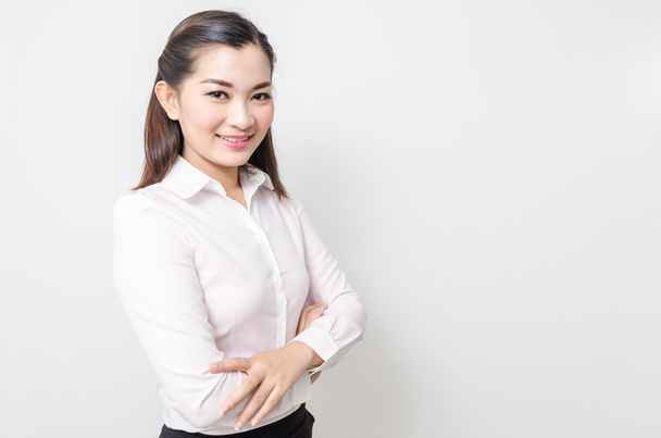 Portret van lachende zakenvrouw, geïsoleerd op witte achtergrond - Foto, afbeelding