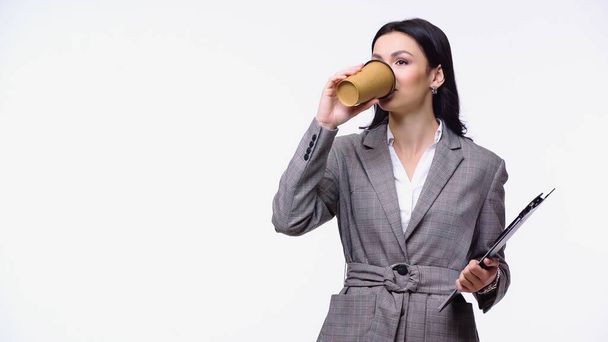 Businesswoman drinking coffee to go isolated on white - Foto, imagen