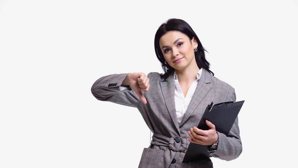 Businesswoman with clipboard showing dislike isolated on white - Foto, Imagem