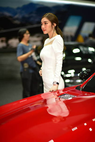 Bangkok Thailand August 24 2019 blur Unidentified Pretty is presenting a car for sale at the Bangkok Motor Show - 写真・画像