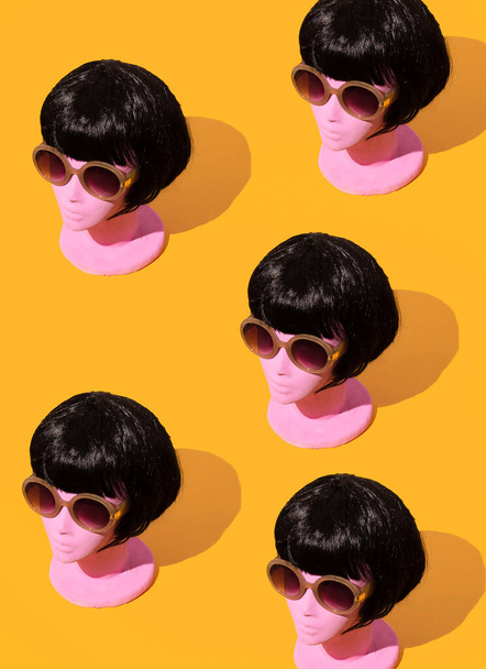 Dummy fashion mannequins brunette  lady in stylish retro sunglasses. Summer, vacation, holiday concept. Minimalist isometric wallpaper - Fotoğraf, Görsel