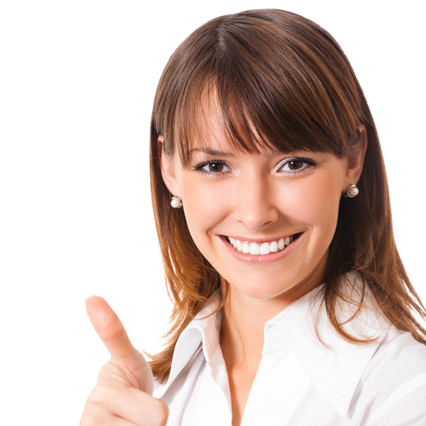 Businesswoman with thumbs up, on white - 写真・画像