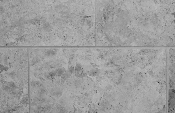 Fondo in marmo pieno telaio grigio beige piastrellato con dettaglio roccia - Foto, immagini