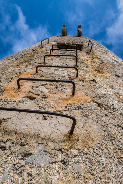 A closeup shot of stairs of an old tower from the war in Mallorca, Spain - Fotó, kép