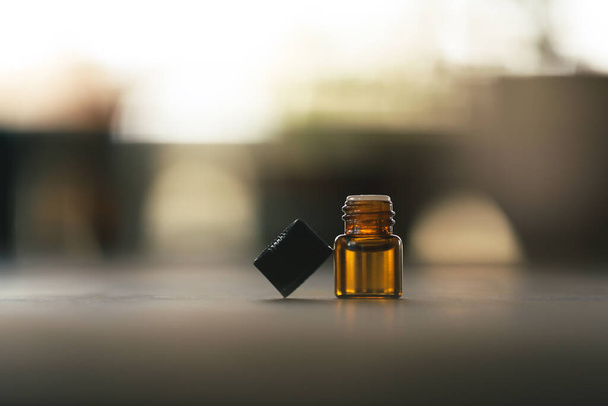 A closeup shot of 1ml amber essential oil vial - Foto, afbeelding