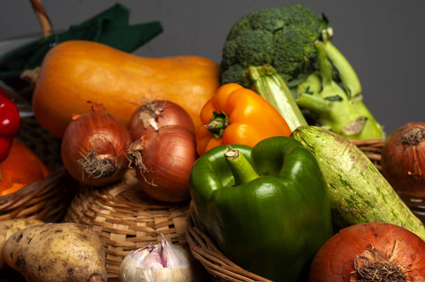 A shot of the vegetables gathered together including pepper, broccoli, onions, etc. - Fotografie, Obrázek