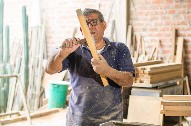 The elder or senior learn new skills, Learn to become a carpenter. - Photo, Image