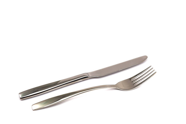 Nůž a vidlice izolované na bílém pozadí - Fotografie, Obrázek