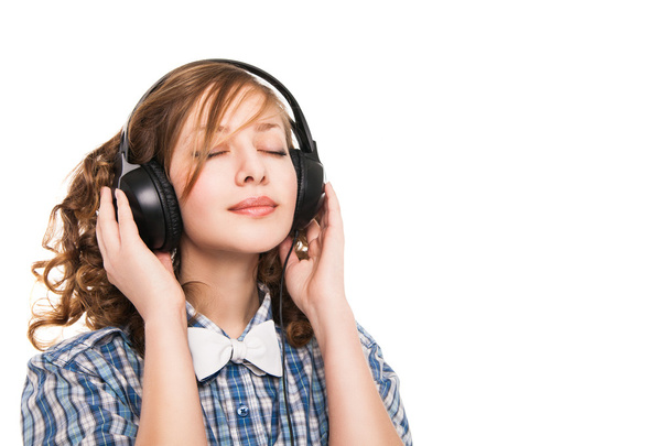 Woman with headphones listening music - Foto, imagen