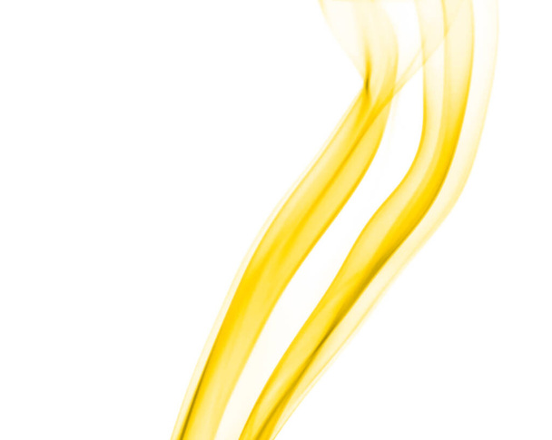Abstract swirling movement of yellow smoke moving on white background. Steam fire design - Фото, зображення