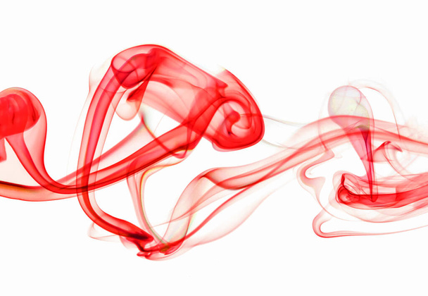 wirujący ruch grupy czerwonego dymu, abstrakcyjna linia izolowana na białym tle - Zdjęcie, obraz
